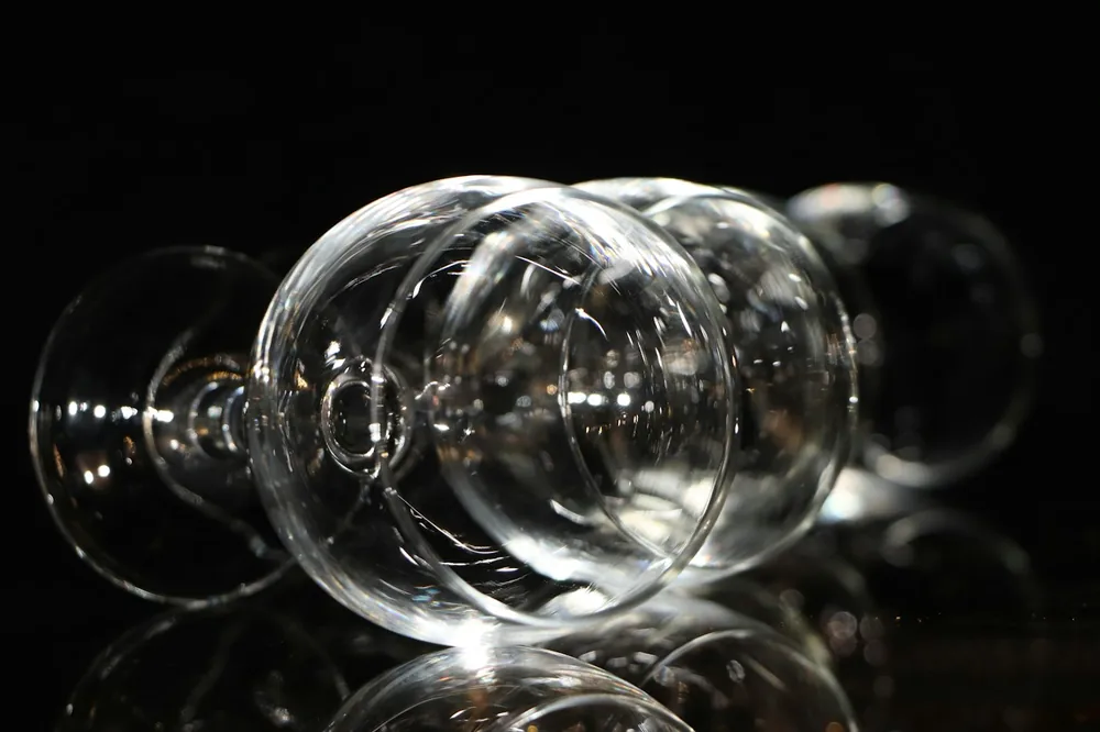 A group of wine glasses sitting on top of a table