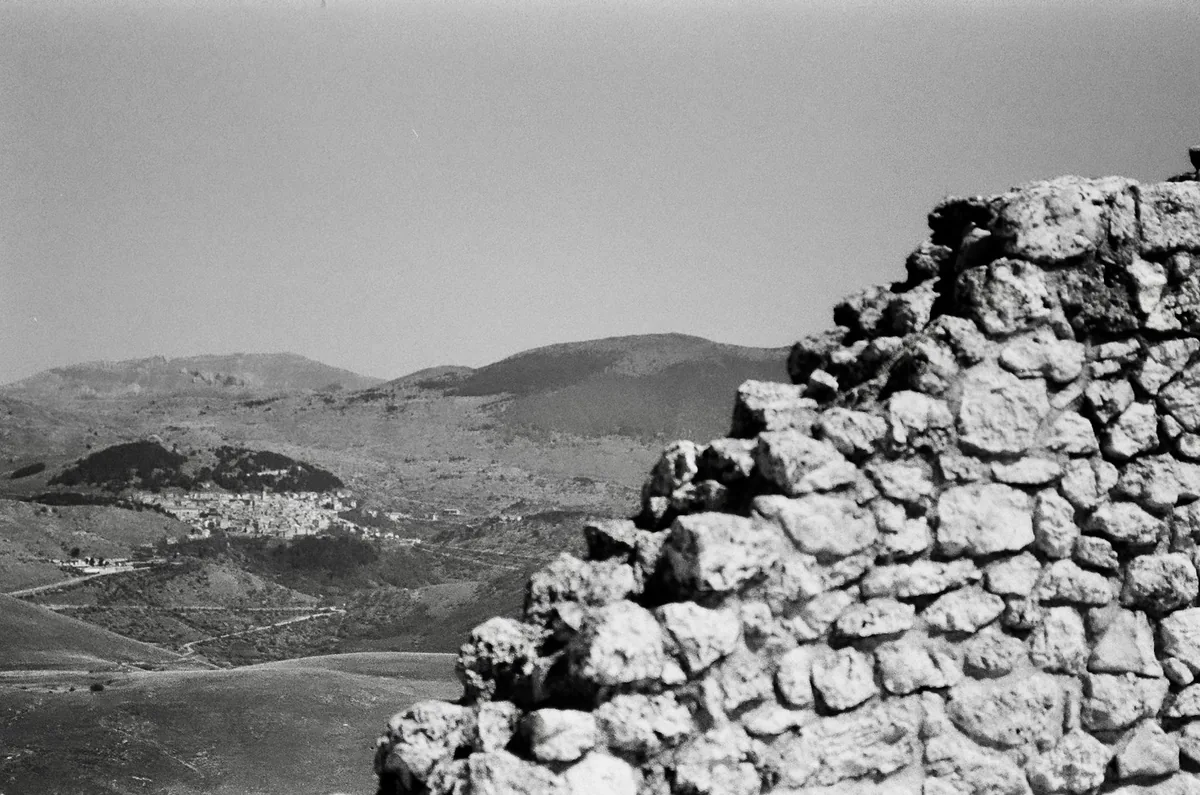 A black and white photo of a mountain range