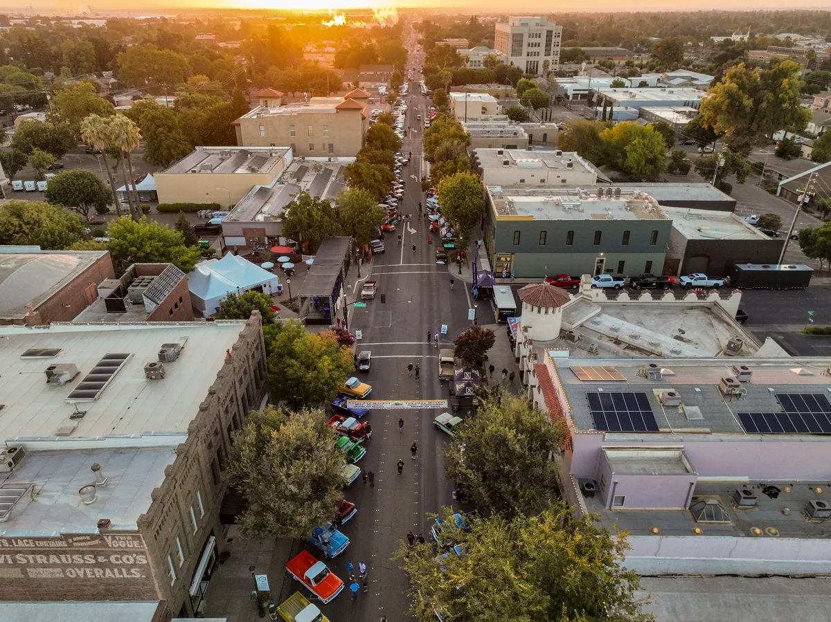 The city streets of Woodland, CA at sunset