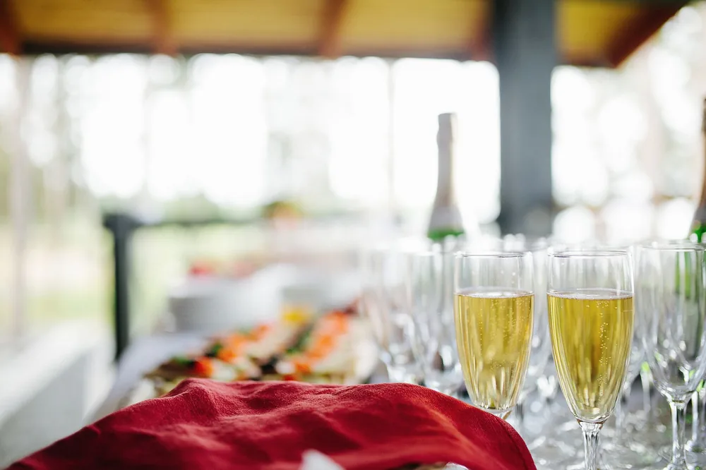 Champagne glasses arranged elegantly indoors with a festive ambiance, perfect for celebrations