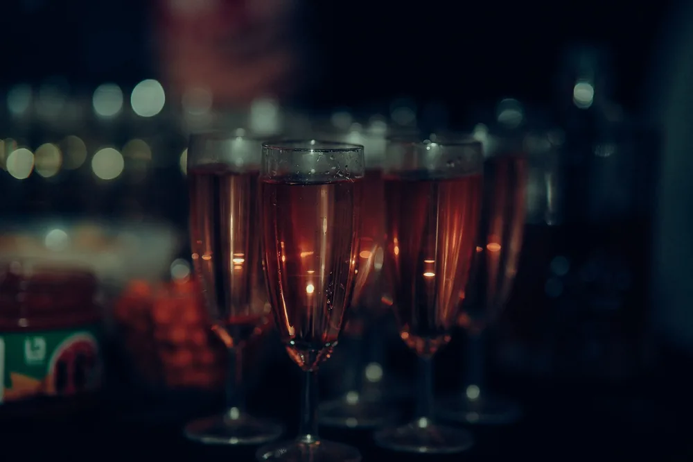 Champagne glasses at a party, capturing a festive atmosphere