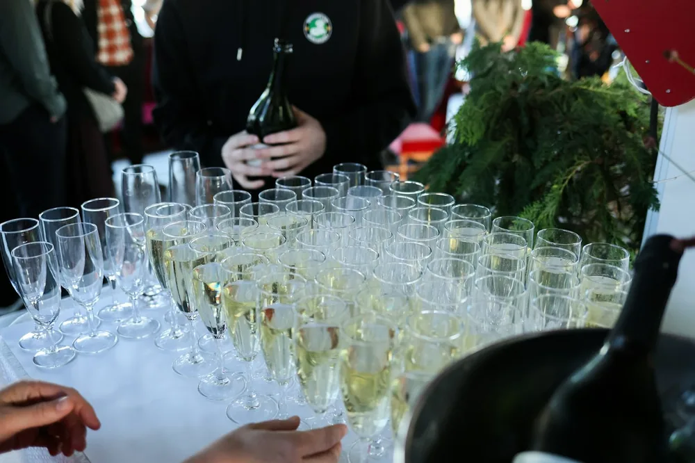 Champagne glasses filled with bubbly on ice