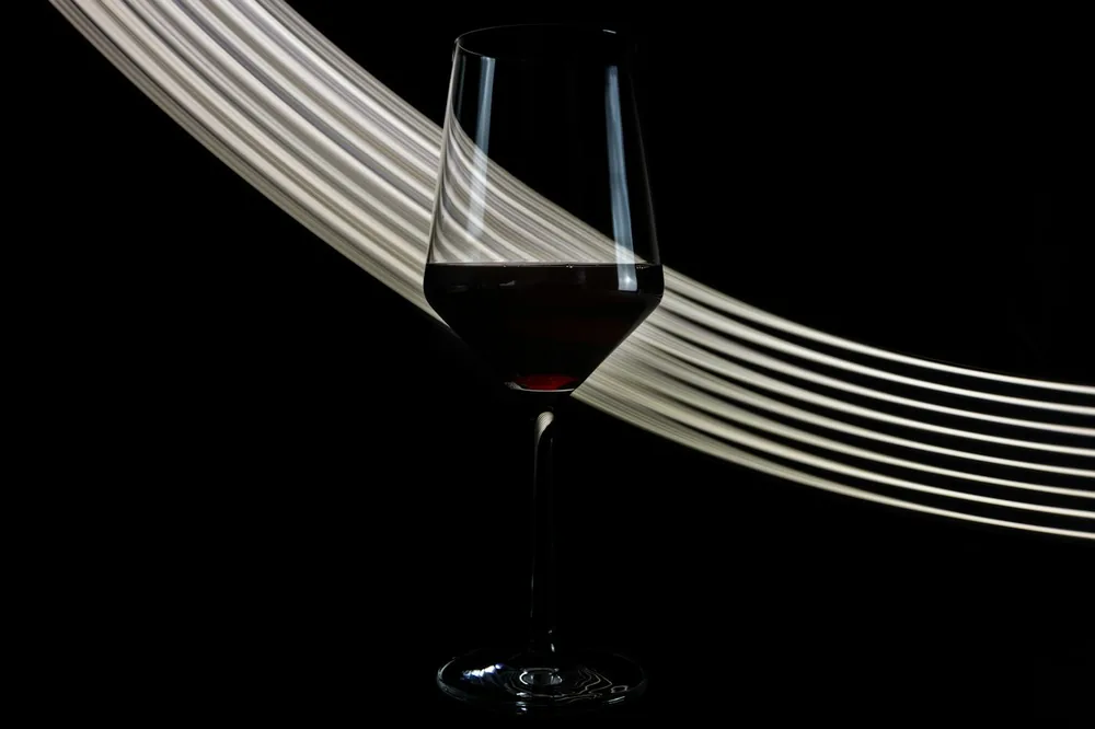 Clear wine glass with red wine