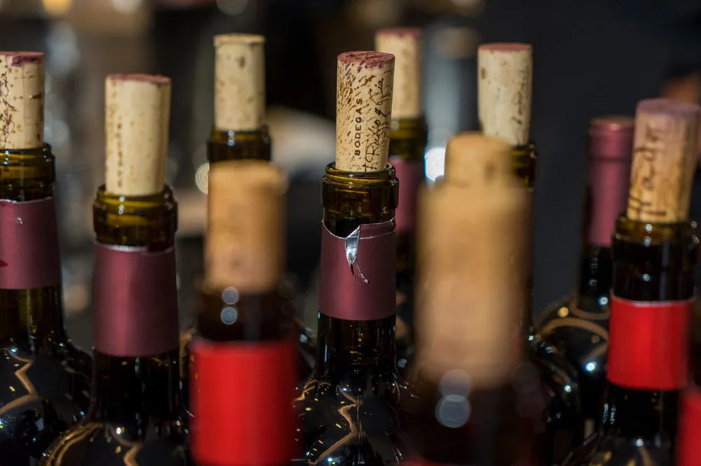 Close-up view of elegantly corked wine bottles with selective focus. Perfect for wine and lifestyle themes