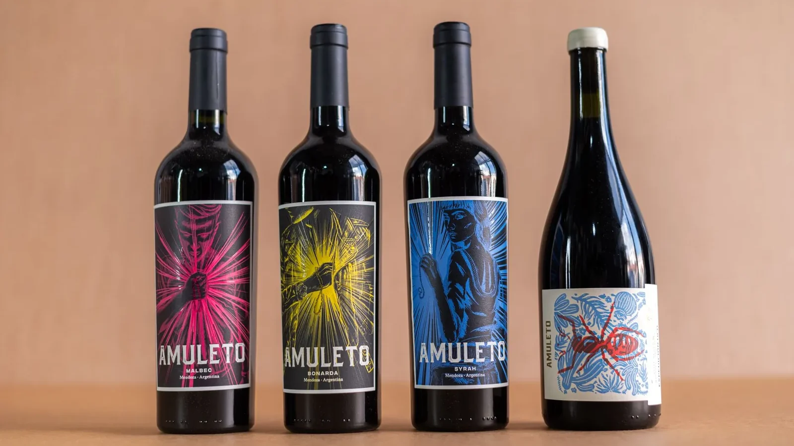 Four exquisite wine bottles with artistic labels on a minimalist background, perfect for a winery product showcase