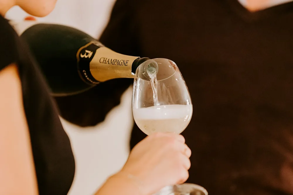 Pouring Champagne into a glass