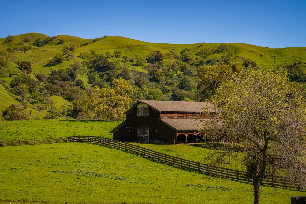 Rolling hills and a rustic barn in Sunol, California