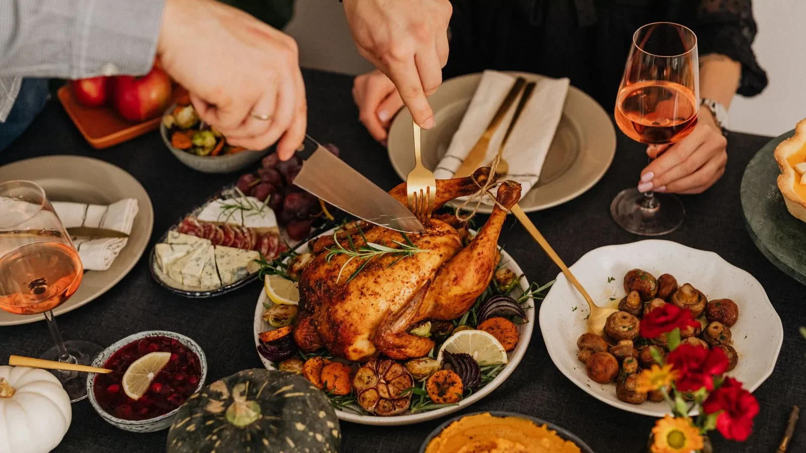 Thanksgiving dinner featuring roasted chicken and various side dishes